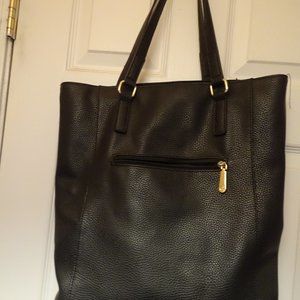 Black leather bag, 14 x 15", front zip pocket, 2 inside pockets, clean
